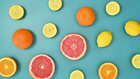 Tropical summer pattern with citrus fruits on vivid blue background. Stop motion Video stock 192510672