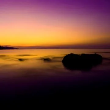 Tropical sunset on the beach. Vector Fotos de archivo