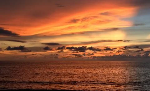 Tropical sunset with fire Sky Stock Photos