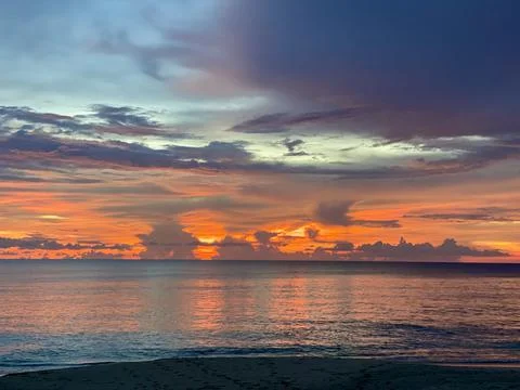 Tropical sunset with fire Sky Stock Photos
