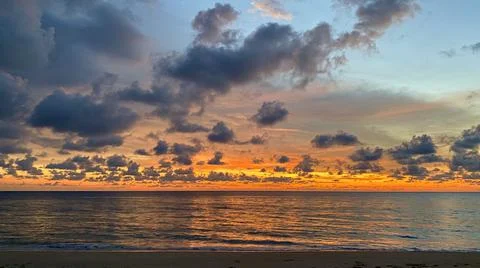Tropical sunset with fire Sky Stock Photos