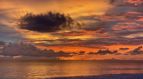 Tropical sunset with fire Sky Stock Photos