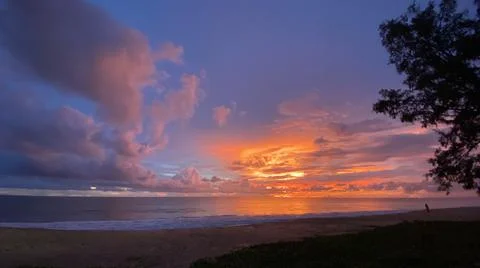 Tropical sunset with fire Sky Stock Photos