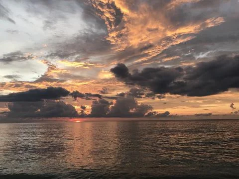 Tropical sunset with fire Sky Stock Photos