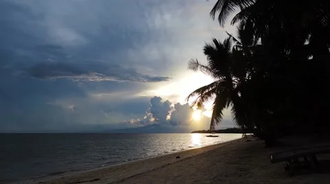 Tropical sunset over a cloudy sky Stock Footage 40050309