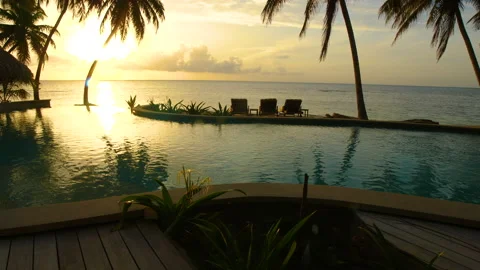 Tropical Sunset over Pool and Ocean Nicaragua Stock Footage 135095163