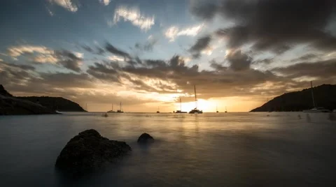 Tropical sunset over the see time lapse Stock Footage 61077650