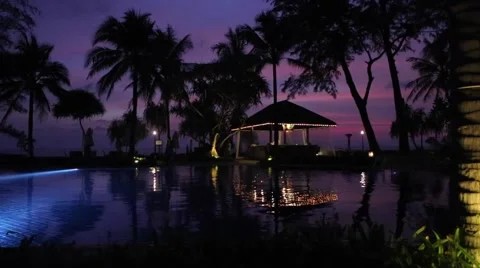Tropical Sunset Swimming Pool Bar Near Ocean Stock Footage