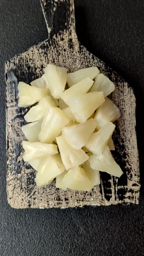 Tropical sweet tinned pineapple fruit sliced into slices Stock Footage 306474157