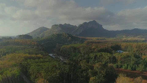 Tropical Thai cheo lan long national park jungles sunset drone flight, wild Stock Footage 87037173