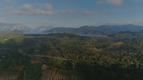 Tropical Thai cheo lan long national park jungles sunset drone flight, wild Stock Footage 87040060
