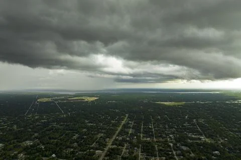 Tropical thunderstorm precipitation falling down on Florida town. Rain show.. Stock-Fotos