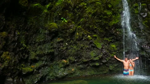 Tropical Waterfall Couple Stock Footage 52994714