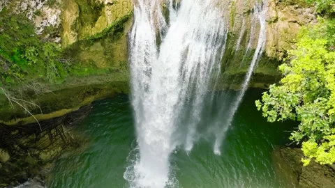 A tropical waterfall in a mountain canyon. Stock Footage 235752253