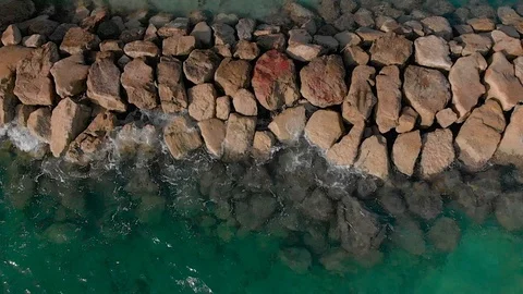 Tropical waves crashing on rocks - Slow Stock Footage