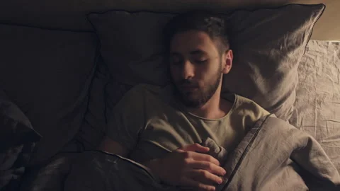 Trouble sleeping panic attack man anxiety disorder Stock Footage 130365532