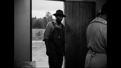 Troubled Farmer Comes Into Kitchen And Talks To His Wife Cooking Stock Footage 107809183