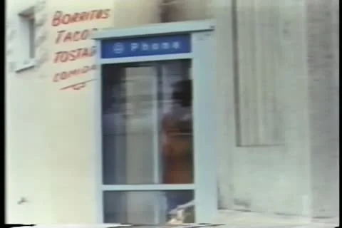 Troubled man in phone booth 스톡 동영상 11345904