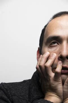 Troubled man on a white background Stock-Fotos