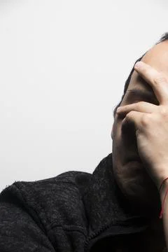 Troubled man on a white background Stock Photos