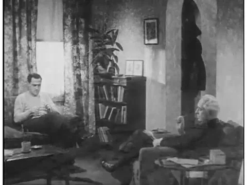 A troubled seaman son paces at home, hunts a rabbit with his dad and sees a Stock Footage 75414324