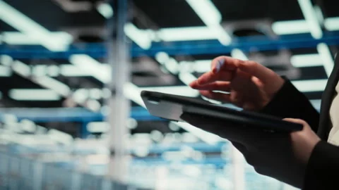 Troubleshooting, tablet closeup and admin in data center Stock Footage 329332373