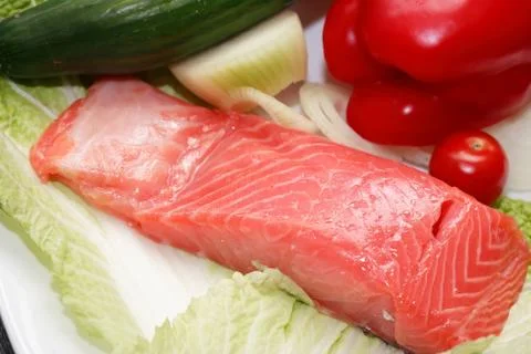 Trout and vegetables Stock Photos