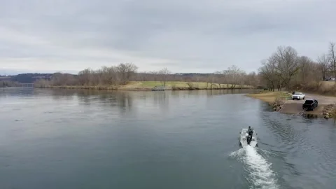 Trout Boat Headed to the Dock on the White River in Norfork, Arkansas Stock Footage 172830945