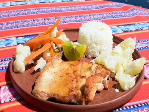 A trout dish with rice and vegetable Video stock 80264454