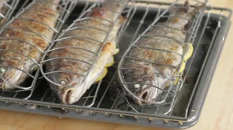 Trout grilled in the oven Stock Footage 24665540