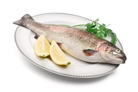 Trout with lemon Stock Photos