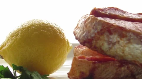 Trout with lemon on a plate Stock Footage 60128446