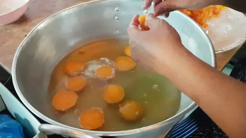 Trouxas das Caldas or The process of producing egg yoke fudge balls or Thon.. Stock Footage 227103746