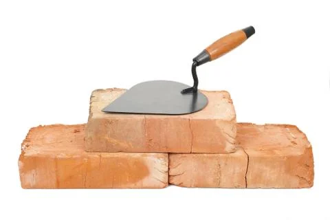 Trowel on bricks Stock Photos