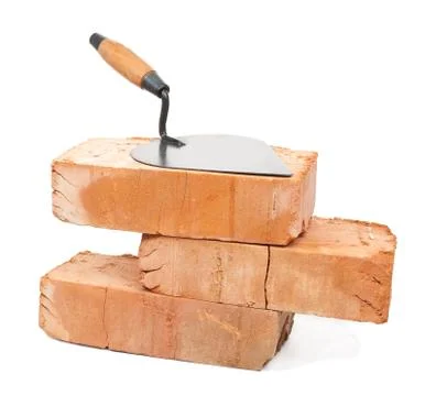 Trowel on bricks Stock Photos