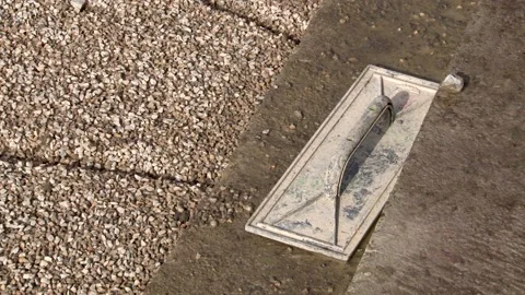 A trowel on the stairs, left behind after construction site works. Video stock 234132453