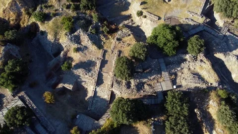 Troy ancient city in present-day Hisarlık at sunset. Aerial top down Stock Footage 308913995