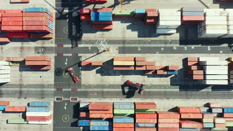Truck and loader work in container port Stock Footage 221718824