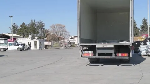 Truck arriving for loading with of boxes of humanitarian aid Stock-Footage 233164271