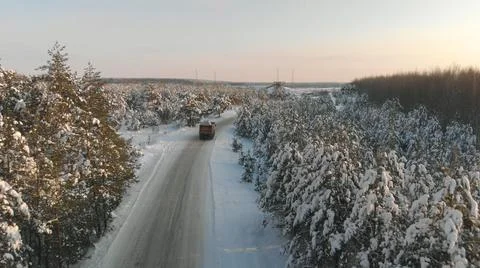Truck carries snow for processing 스톡 사진