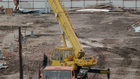 Truck with crane on construction site Stock Footage 163735096