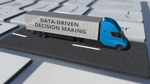 Truck with DATA-DRIVEN DECISION MAKING text on the computer keyboard, conceptual Stock Footage 148301414