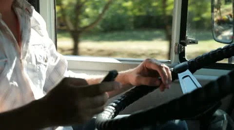 Truck Driver in Cab Stock Footage