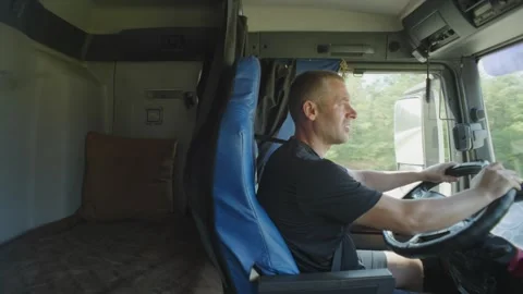 Truck Driver Navigating to Cargo Destination Stock Footage 309297914