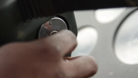 Truck driver turns key to start engine Stock Footage 80078000