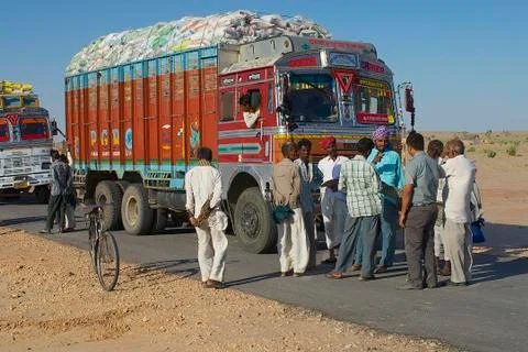 Truck drivers talk on the road  in Jamba, Rajasthan, India. Stock Photos