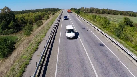 Truck driving along empty freeway in Russia. Aerial drone view. Stock Footage 101907804