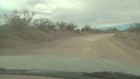 Truck driving down dirt road Stock Footage 78551205