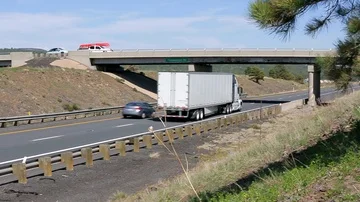 Truck Driving Down Highway Stock Footage 85863983