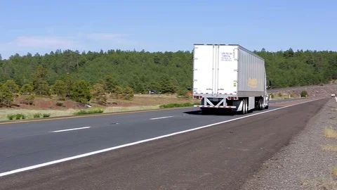 Truck Driving Down Highway Stock Footage 85864047